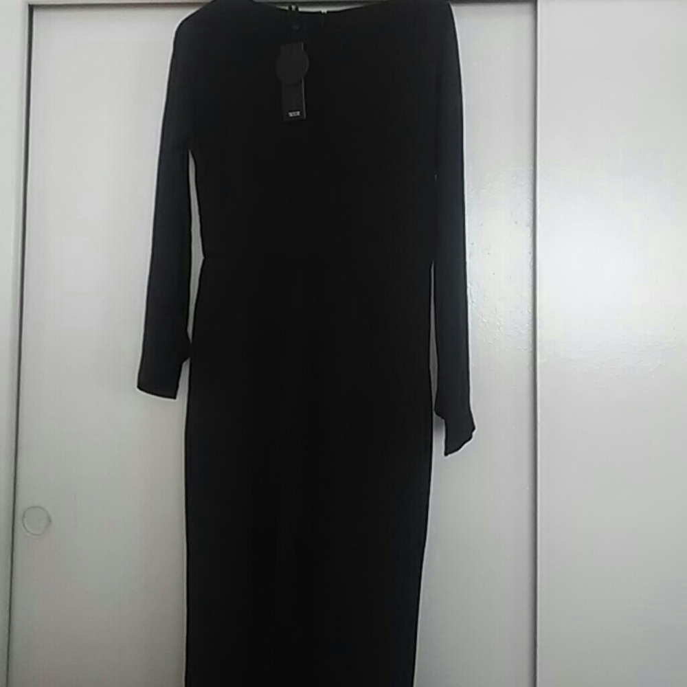 Nice Black Jumpsuit long sleeves very nice.